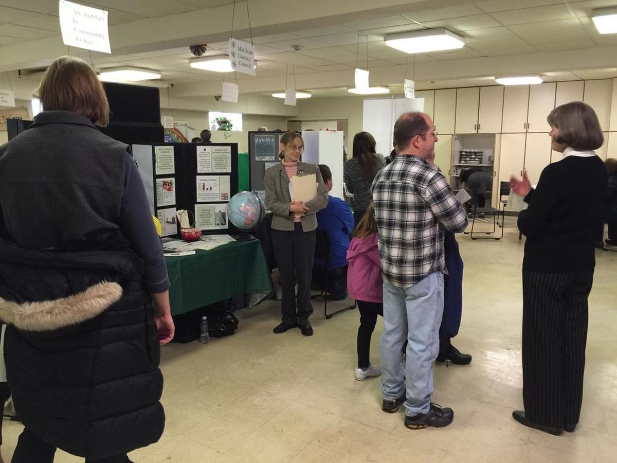 People peruse booths at the Alternative Christmas Fair to showcase local nonprofits at University Baptist and Brethren Church in State College in 2016.