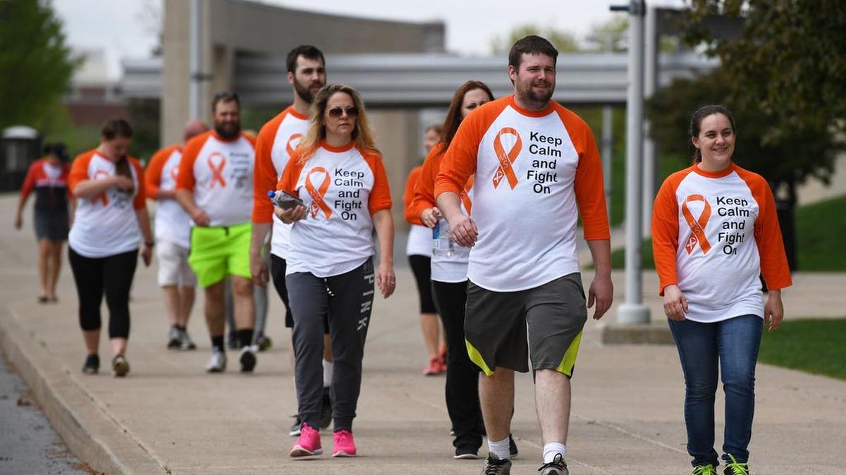 Team Schubert walks on Curtin Road during Sunday’s Walk MS: State College to raise awareness and funds for the fight against multiple sclerosis.