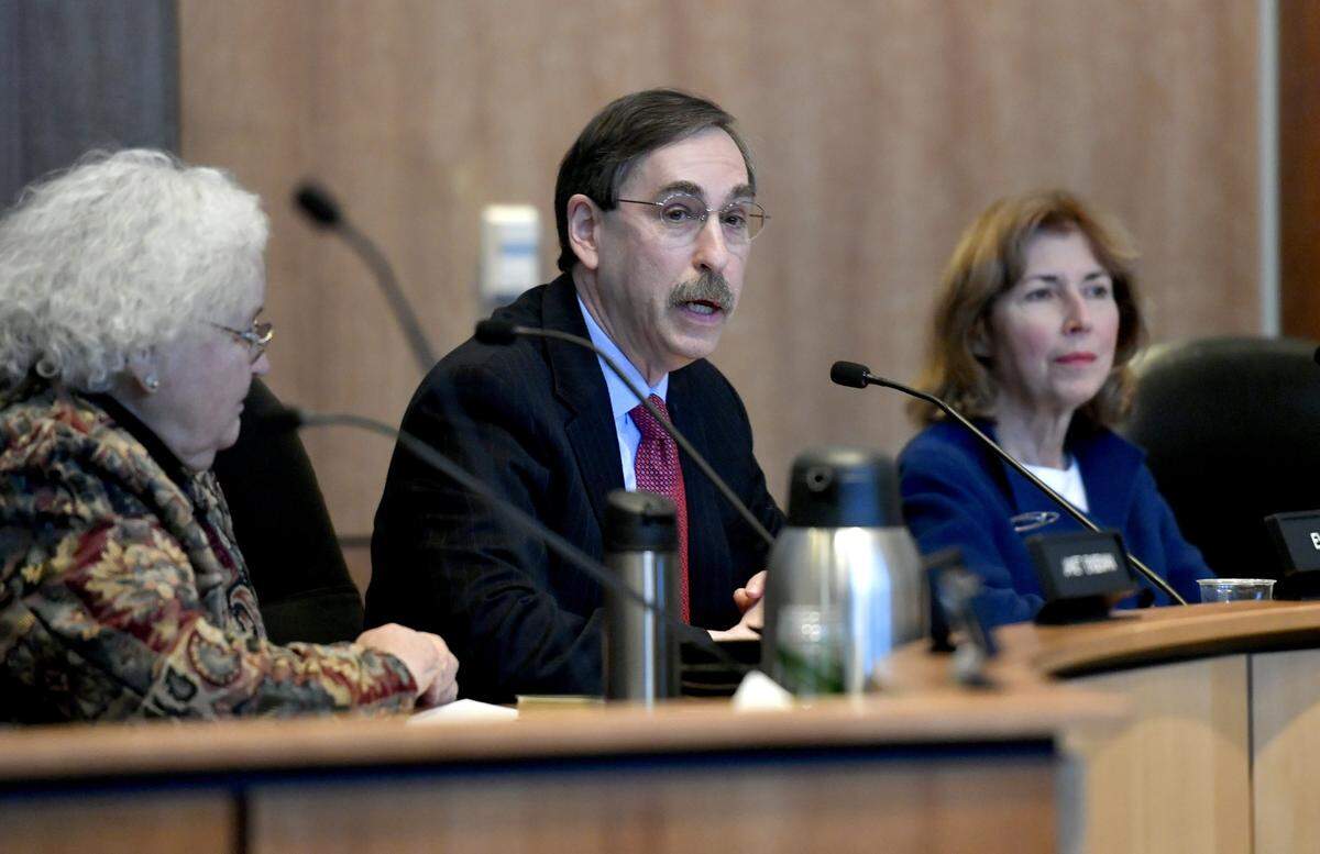 State College borough council President Evan Myers speaks during a State College borough council meeting Jan. 2, 2017.