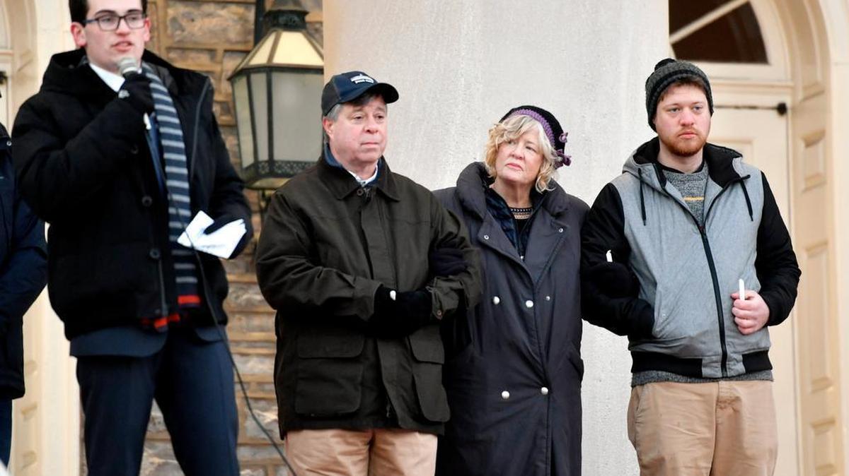 William Denton's family, dad Van, mom Tali, and brother Tal listen as Tanner Gattuso speaks about William's bright personality during a vigil organized by Alpha Tau Omega on Thursday, January 18, 2018.