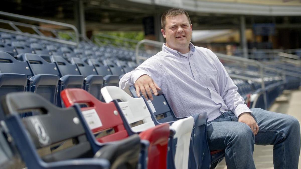 Mark Campbell, along with fellow members of the Pine Grove Mills VFW and Sgt. Bob, initiated veterans seats at Medlar Field. The row features red, white and blue seats, and a black, POW-MIA seat at the end, which remains empty.