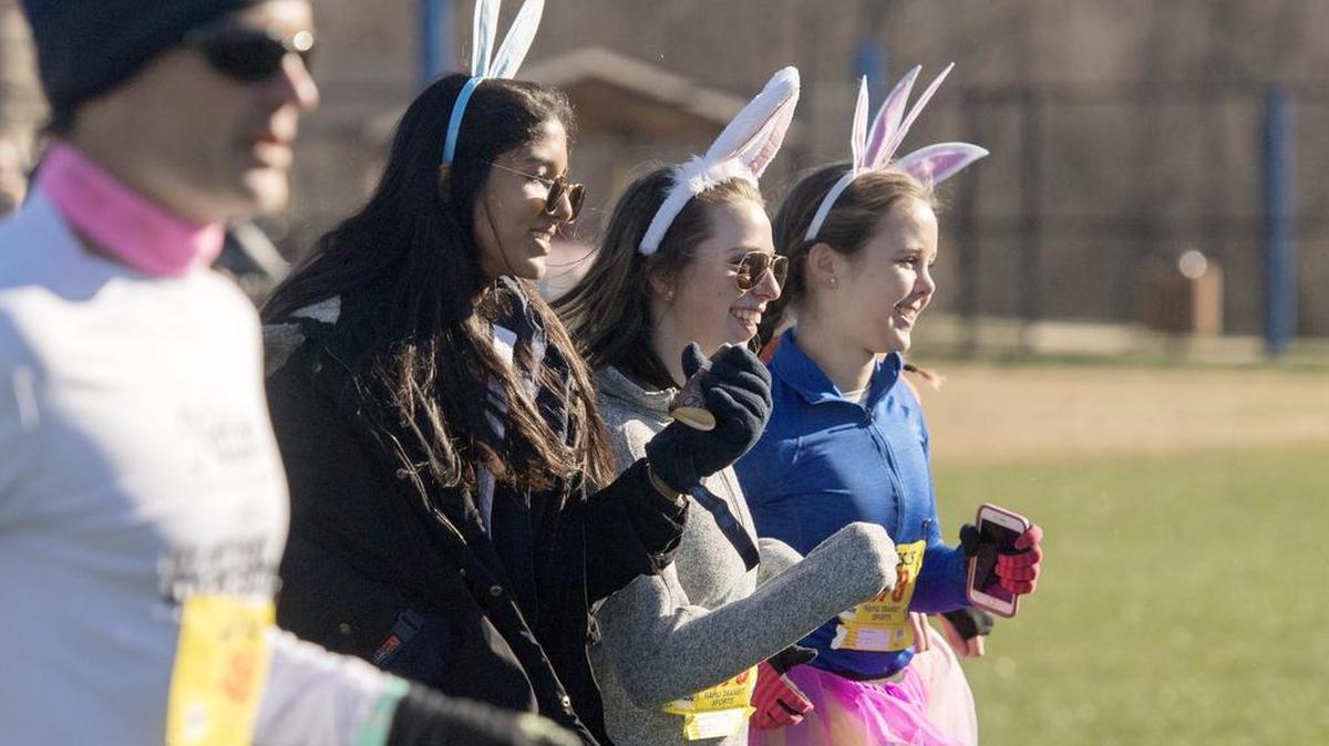 With bunny ears and smiles, runners take off from the starting line for the State College Area High School National Honor Society’s Bunny Hop 5K on Saturday at Circleville Park. The race raised $8,000 for the Four Diamond Fund in honor of State High graduate Maryann Newcomb, who is battling leukemia.