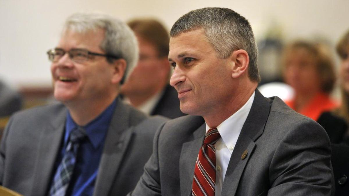 James Leous, left, and Bob O’Donnell, superintendent for the State College Area School District, listen to Rep. Glenn Thompson during an education policy symposium in State College on Thursday, Jan. 28.