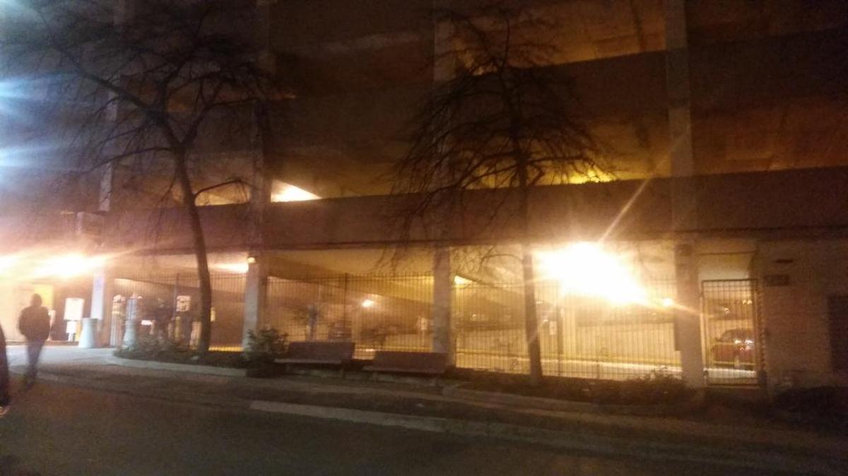 Alpha Fire crews respond to a car fire early Sunday morning in the Pugh Street parking garage in downtown State College.
