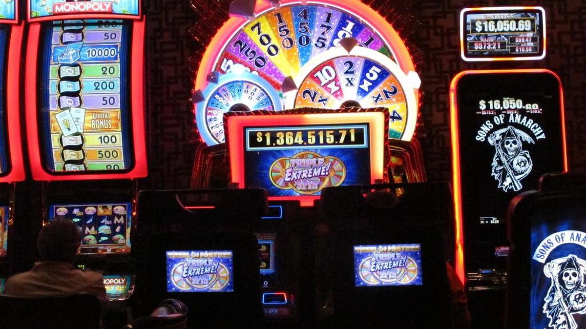 This June 24, 2016 photo shows slot machines inside the Golden Nugget casino in Atlantic City N.J. Figures released by New Jersey gambling regulators on Nov. 22, 2017 show the city's casinos posted an increase in gross operating profit of nearly 21 percent in the third quarter of this year compared to last year. (AP Photo/Wayne Parry)