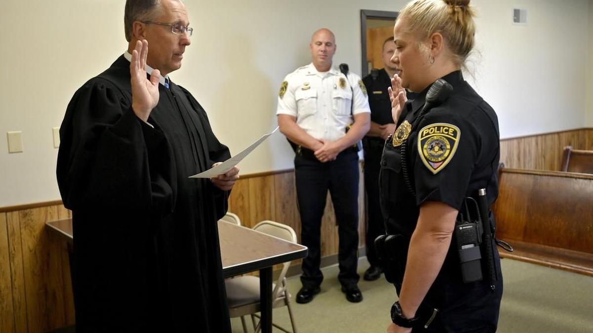 Lara Hannegan gets sworn in to the Spring Township Police Department by District Judge Thomas Jordan in 2016. Spring Township has been named one of “The Safest Cities in Pennsylvania” for 2017 by the National Council for Home Safety and Security.