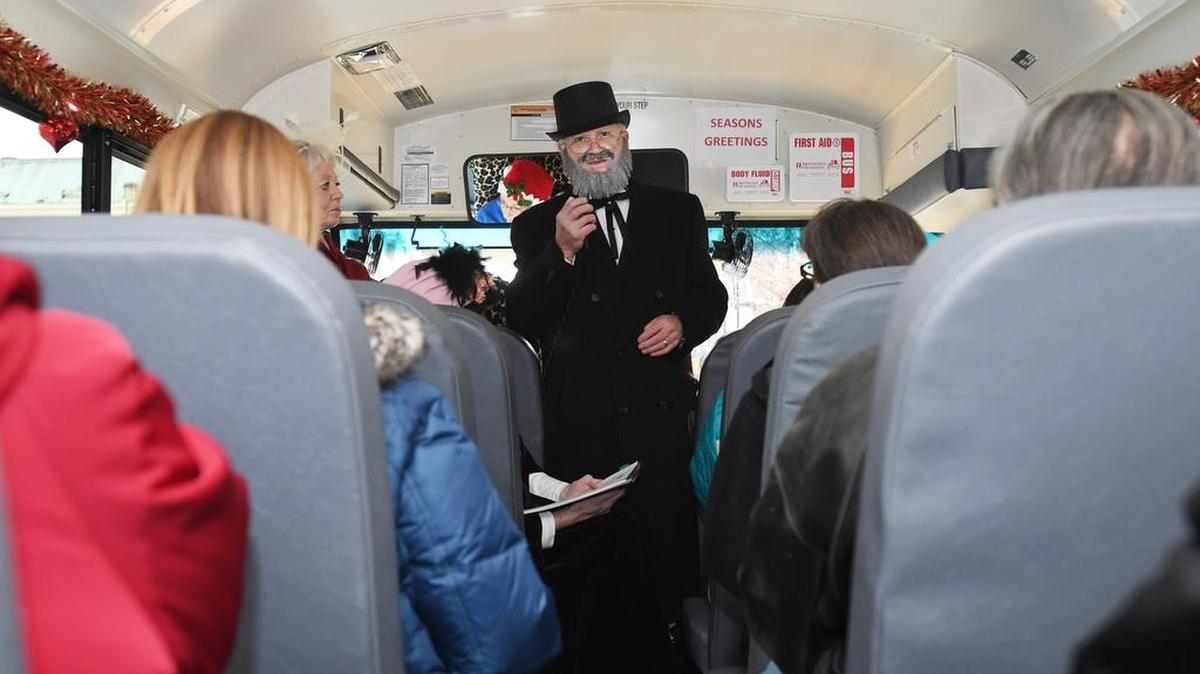 “Gov. James Beaver,” also known as David Dimmick, speaks about how Beaver Stadium is named after him on Saturday during the Bellefonte Women’s Club History On Wheels Guided Bus & Homes Tour, as part of Bellefonte Victorian Christmas.
