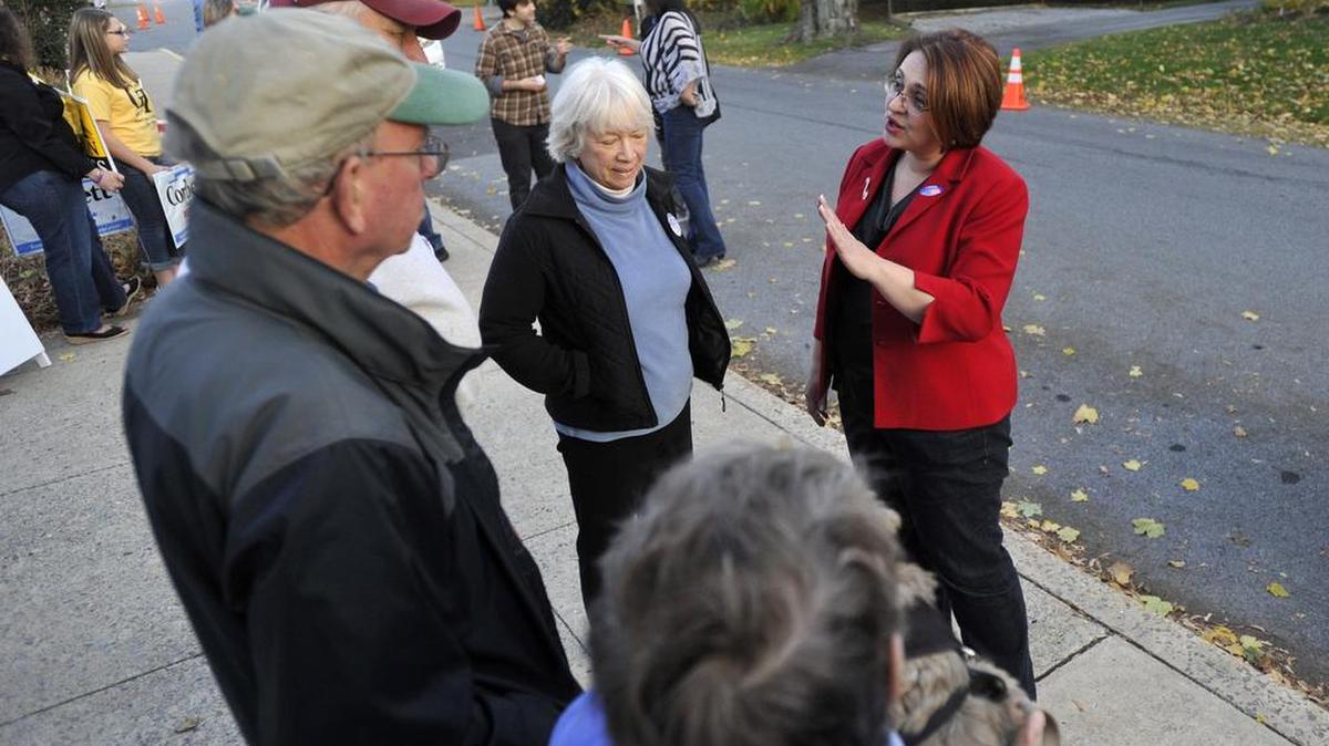 Kerith Strano Taylor talks with voters at the Boalsburg fire hall on Nov. 4, 2014.