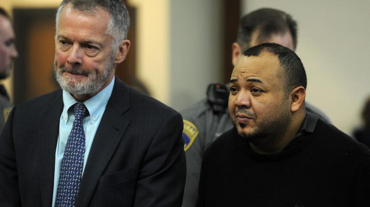Oscar Hernandez, right, with his attorney John R. Gulash, faces Judge William Holden in Bridgeport Superior Court on Monday in Bridgeport, Conn. Hernandez, 39, was arraigned on murder and kidnapping charges, his bond set at $2 million.