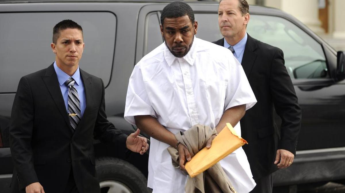 Centre County Sheriff’s deputies escort former SCI Rockview inmate Omar Best into the Centre County Courthouse annex on May 20, 2014.