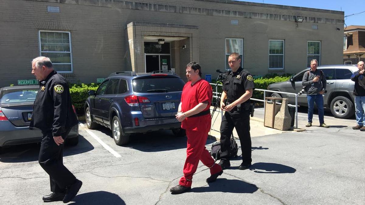 George Ishler is walked from the Centre County Courthouse by sheriff’s deputies on May 9, 2016. George Ishler Jr. walks toward the courthouse on Aug 31 in Bellefonte. A motion filed by Ishler to suppress his confession in the murder case of Penn State professor Ronald Bettig was denied Thursday.
