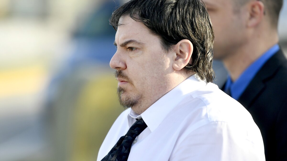 George Ishler Jr. arrives at the Centre County Courthouse for another day of the murder trial of Ronald Bettig on Friday, April 20, 2018.