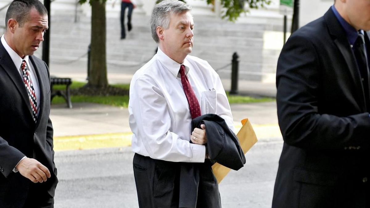 Alois Kudlach enters the Centre County Courthouse Annex on Monday for the trial in the death of his wife, Nuria. Kudlach is charged with first- and third-degree murder, aggravated assault, possession of a weapon and intercepting communications related to the shooting at the couple’s College Township home in August 2015.