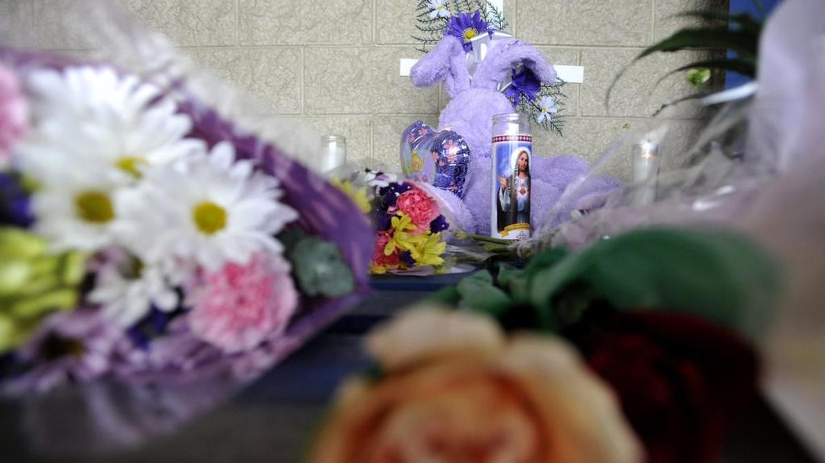 A memorial was set up outside of the County Market in Philipsburg for Traci Miscavish in 2013.