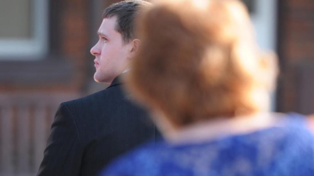 Kyle Swindell walks out of the Centre County Courthouse Monday. He faces felony charges of rape, sexual assault and indecent aggravated assault.