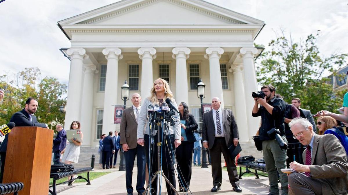 District Attorney Stacy Parks Miller talks to the media Friday about some of the charges dropped in the Beta Theta Pi fraternity case. Parks Miller was ordered on Aug. 4 to act on a criminal complaint filed against her.