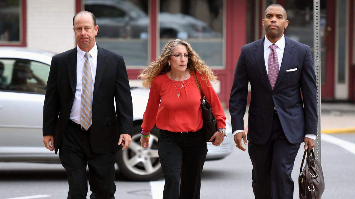 Jim and Evelyn Piazza walk toward the Courthouse Annex for former Beta Theta Pi fraternity member Ryan Burke’s sentencing  on Tuesday, July 31, 2018 in Bellefonte.