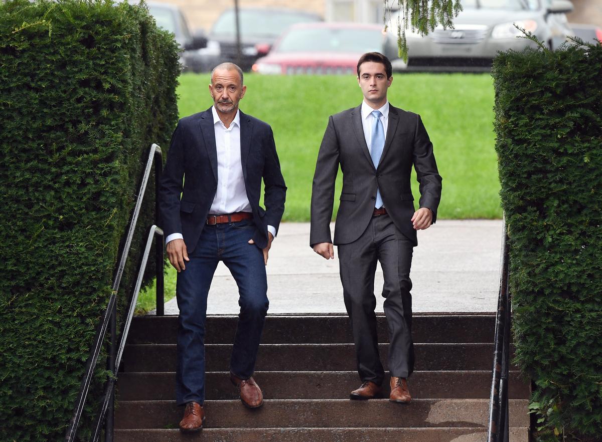 Former Beta Theta Pi house manager Braxton Becker, right, arrived at the Centre County Courthouse on Aug. 21 for the first day of the fourth preliminary hearing related to Timothy Piazza’s death.