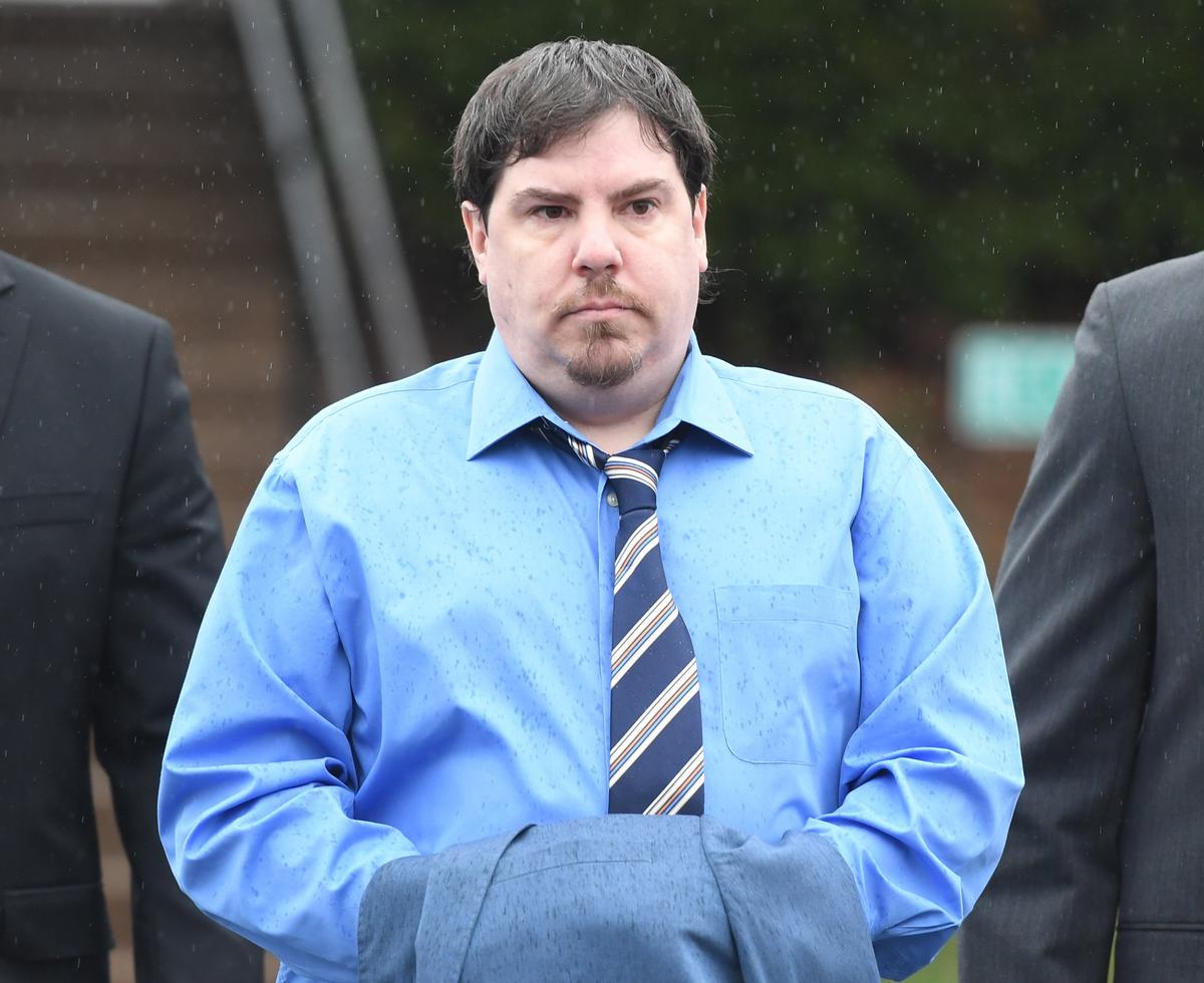George Ishler walks toward the courthouse for the murder trial for Ronald Bettig on Monday, April 16, 2018. at the Centre County Courthouse.