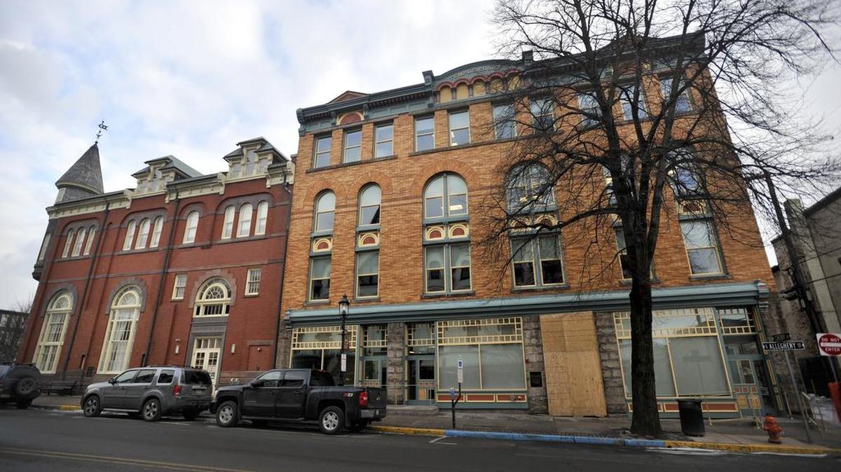 Plans to relocate the county Probation and Parole Office to the Temple Court Building, pictured, have been delayed, the Centre County board of commissioners said Tuesday.