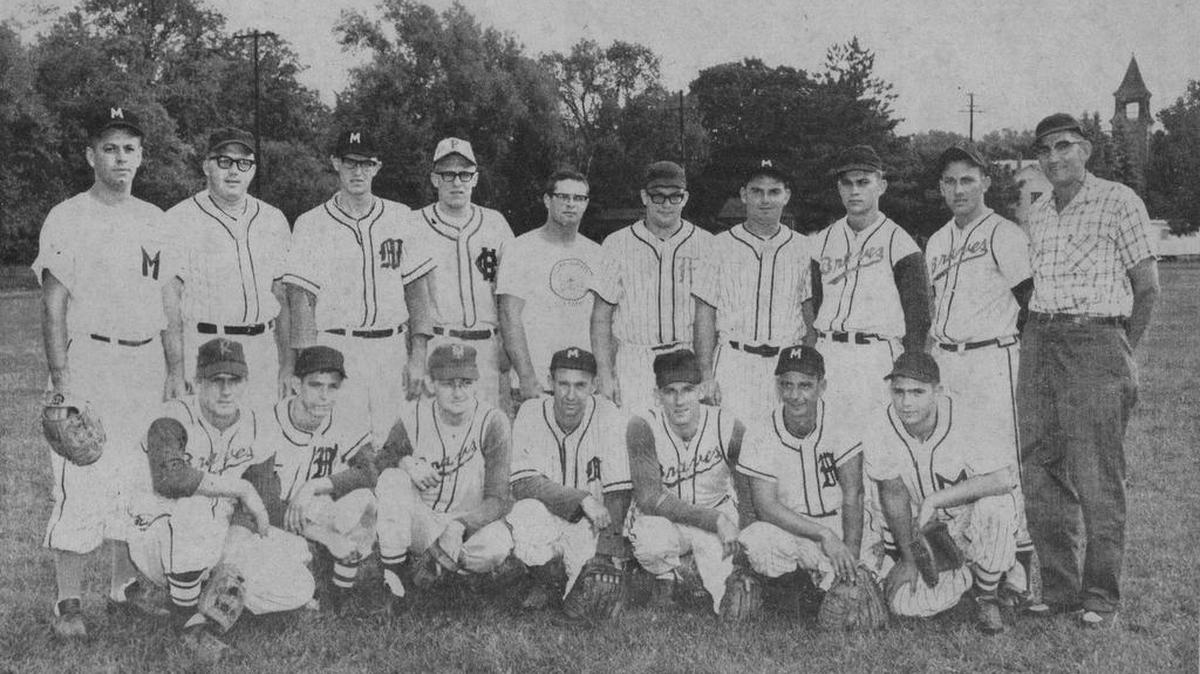 Kneeling, from left, are Marty Ilgen, Joe Slenker, Ron Eisenhart, manager Carl Warntz, Harold Bowersox, James Creeger and Frank Slenker. Standing are Dave Edwards, John McMullen, Don Hosterman, Scott Vogt, Ron Stover, Paul Bartges Jr., Jim Smith, Marlin Bowersox, Harlan Bowersox and Merrill Brungart, one of the announcers.