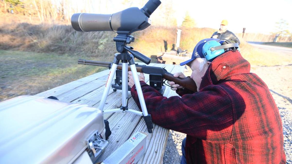 Chip Ward talks about sighting-in his rifle Sunday at the Pennsylvania Game Commission’s Scotia Shooting Range in Halfmoon Township.