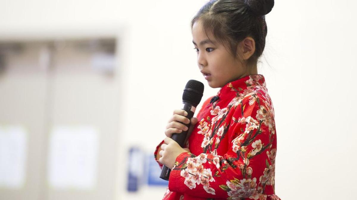 Sophia Cui sings in Chinese during the annual celebration of the Chinese New Year in February at Young Scholars.