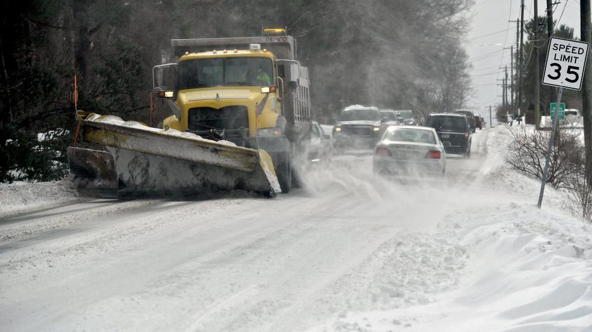 A PennDot truck waits for traffic to plow Fox Hill Road in March 2017.