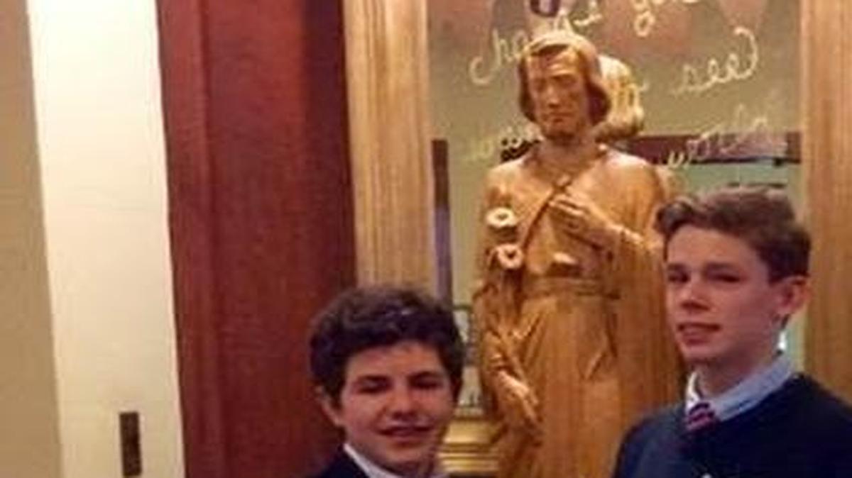 St. Joseph’s Catholic Academy students Joey Wheeler, left, and R.J. Marsh, right, are headed next month to the EconomicsPennsylvania state Entrepreneurship Challenge.