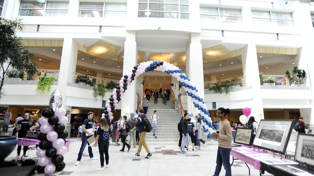 Penn State students walk around the HUB during the Past to Present homecoming event Tuesday, Oct 4, 2016.