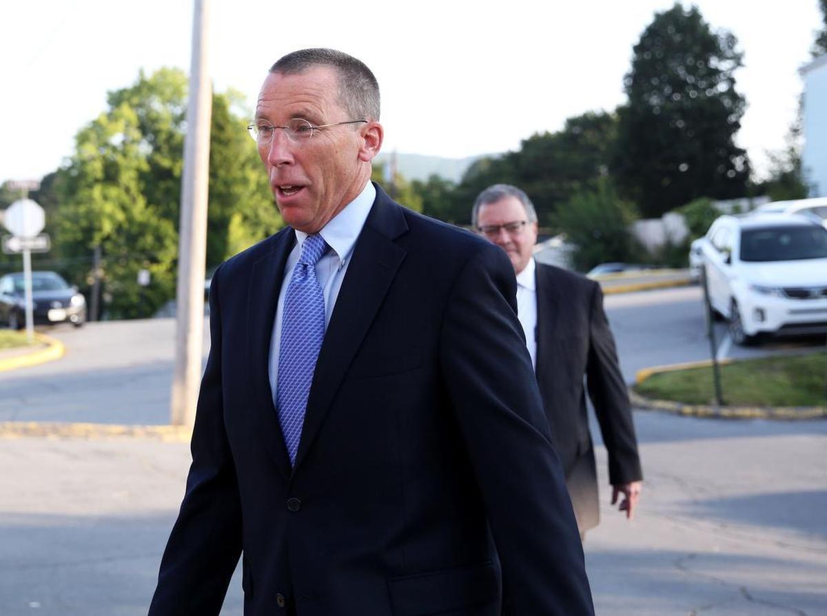 Former Penn State assistant athletic director Tim Bream walks to the Centre County Courthouse in August 2017 in Bellefonte.