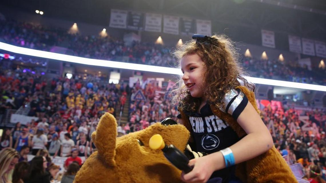 Lauren Keim is lifted up in the air by the Nittany Lion during Penn State’s Thon last year at the Bryce Jordan Center. As children and those with weakened immune systems, often a result of chemotherapy treatments, are especially susceptible to the flu, anyone feeling flu-like symptoms is encouraged to not attend the 46-hour dance marathon this year.