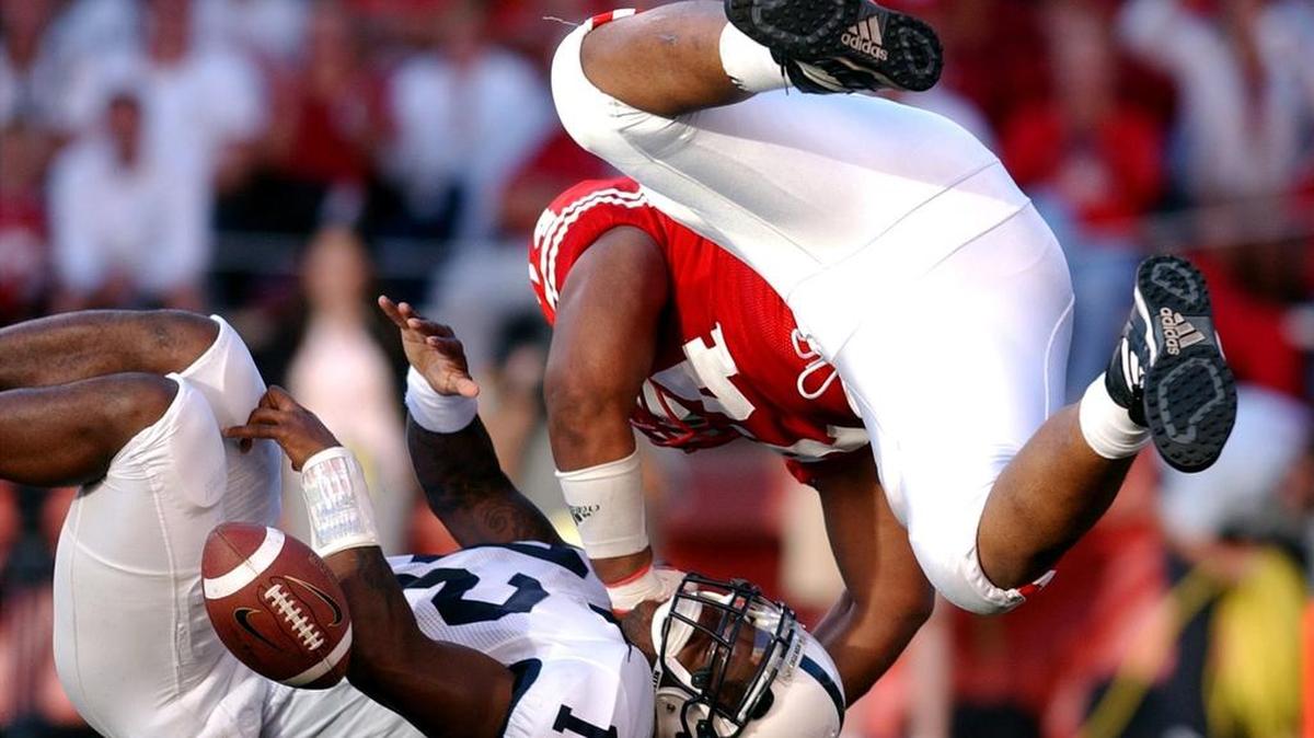 Penn State quarterback Michael Robinson (12) suffered a concussion after a hit by Wisconsin’s Jason Jefferson in 2004. Penn State researchers think the molecules in saliva might be key to diagnosing concussion and detemining the length of symptoms.