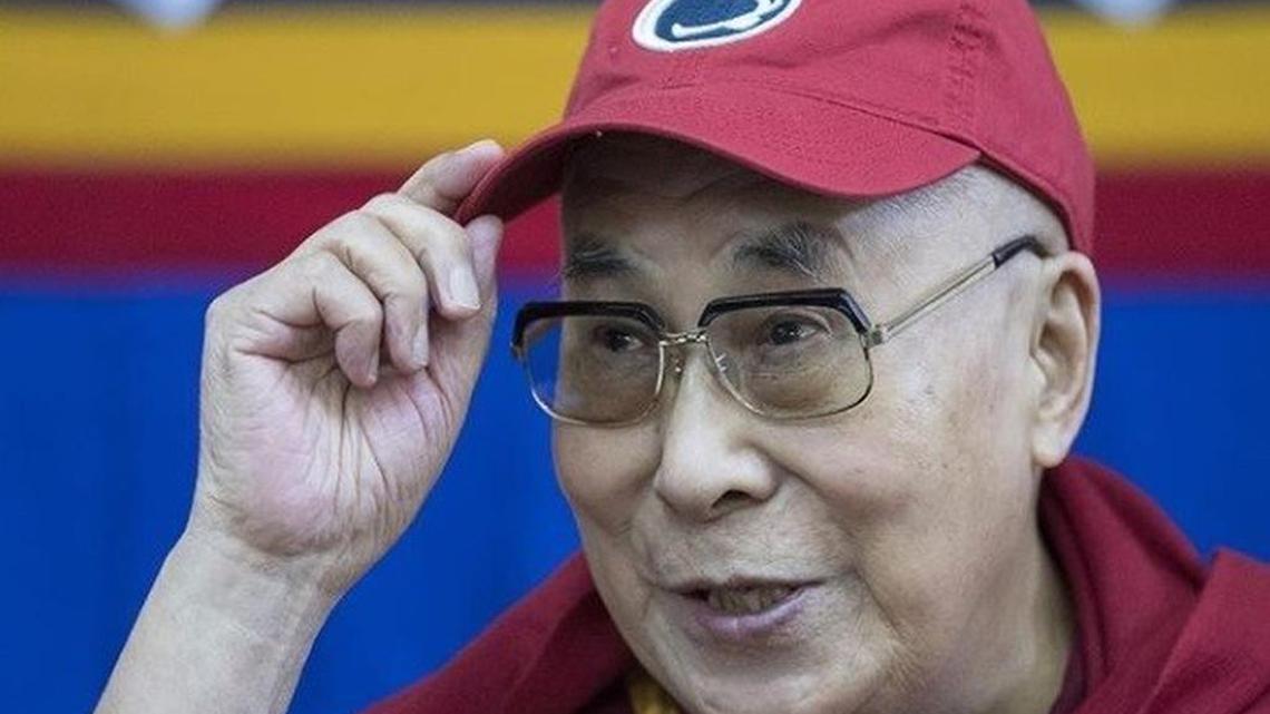 The Dalai Lama wears a Penn State hat