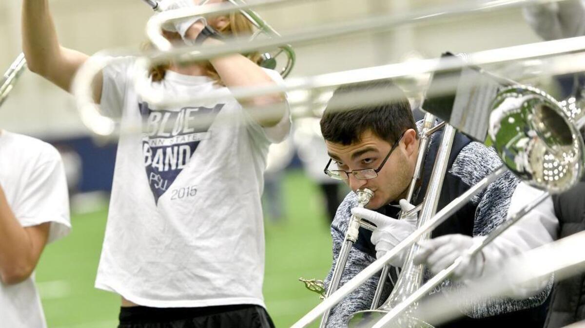 The trombone players from the Penn State Blue Band practice the night before their last home football game performance. The Blue Band Legacy Fund will be part of the fifth annual Giving Tuesday.