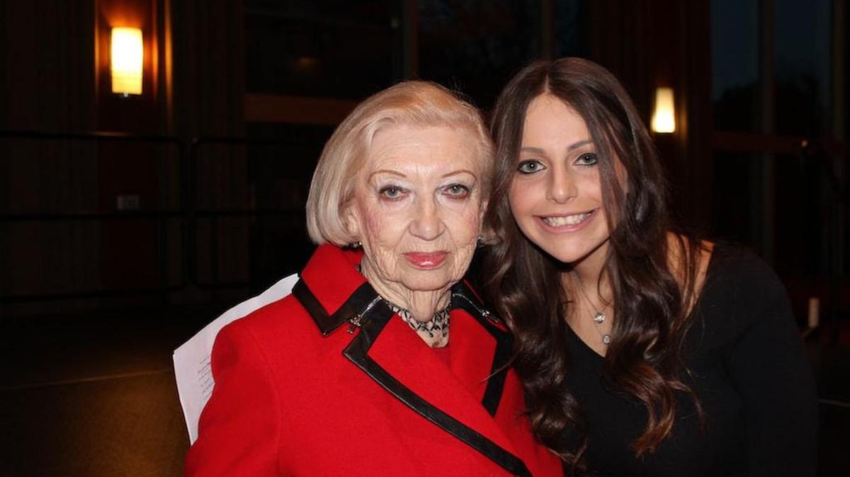 Holocaust survivor Sonia Goldstein, left, poses with her granddaughter Jessica Goldstein, a Penn State student, after her presentation Monday at Penn State’s HUB-Robeson Center.