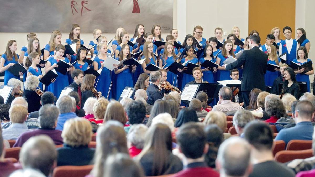 The Concordia Singers sing “Scherzano sul too volto” with the Pennsylvania Centre Orchestra during their concert “Music for the Heart” on Sunday at the Pasquerilla Spiritual Center.