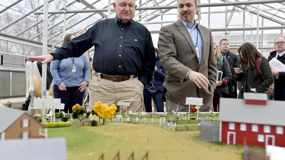 U.S. Secretary of Agriculture Sonny Perdue talks with Peter Kleinman, the research leader for the USDA Agricultural Research Service at Penn State about long-term agroecosystem research during his visit on Wednesday, January 24, 2018.