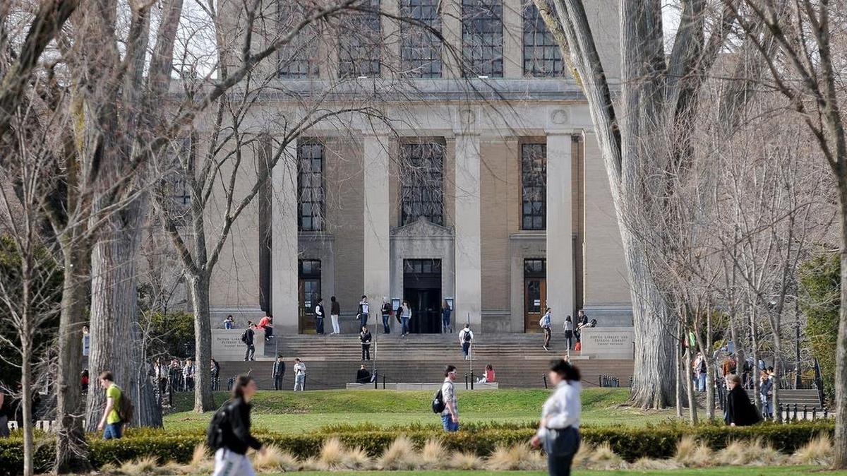 Students walk outside the Pattee, Paterno Library on Thursday, March 17, 2011.