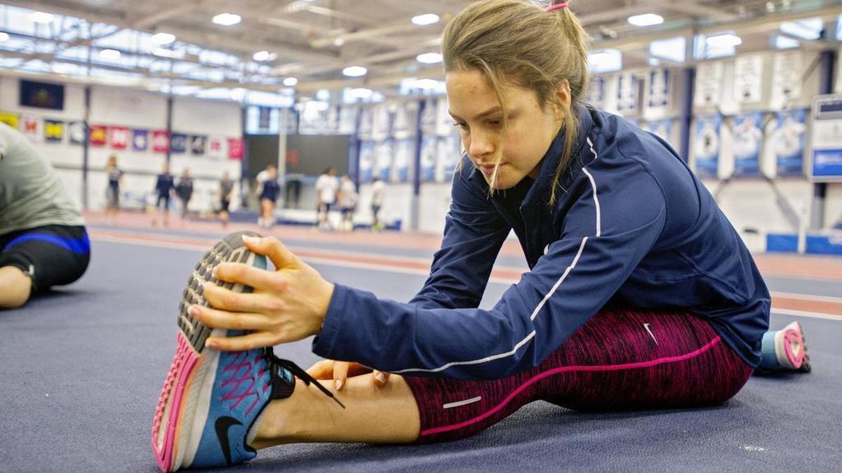 Penn State track athlete Tal Ben-Artzi warms up with her teammates for practice on Dec. 2.