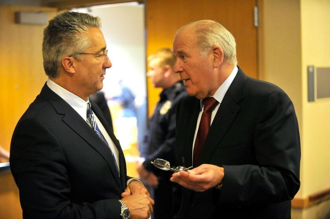 Mark Dambly, left, and Ira Lubert, right, talk on Jan. 16, 2015.