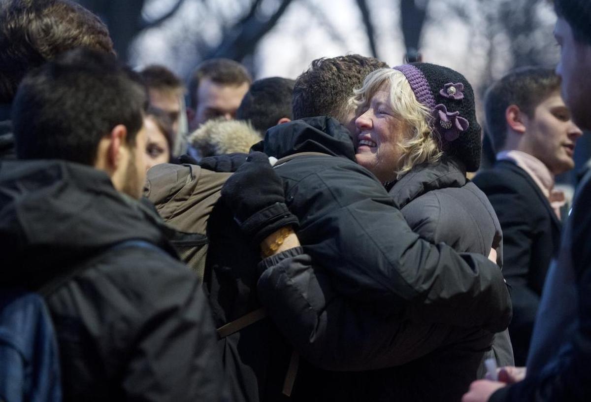 Tali Denton gets a hug from her son’s fraternity brothers after a vigil Alpha Tau Omega organized to remember Will Denton on Jan. 18, 2018.