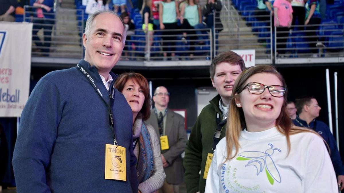 Sen. Bob Casey, D-Pa., looks to the stage as he chats with dancers during his visit to the Penn State IFC/Panhellenic Dance Marathon on Saturday.