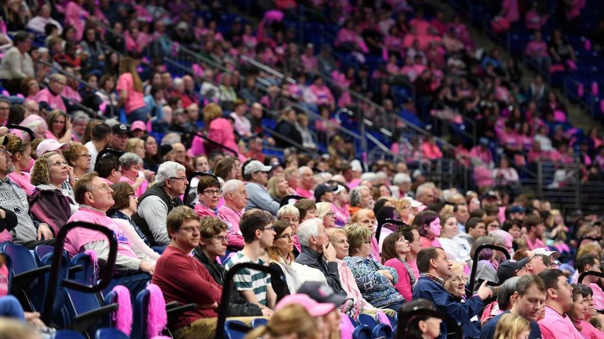 Attendees wear pink during the 2018 Pink Zone game at the Bryce Jordan Center.