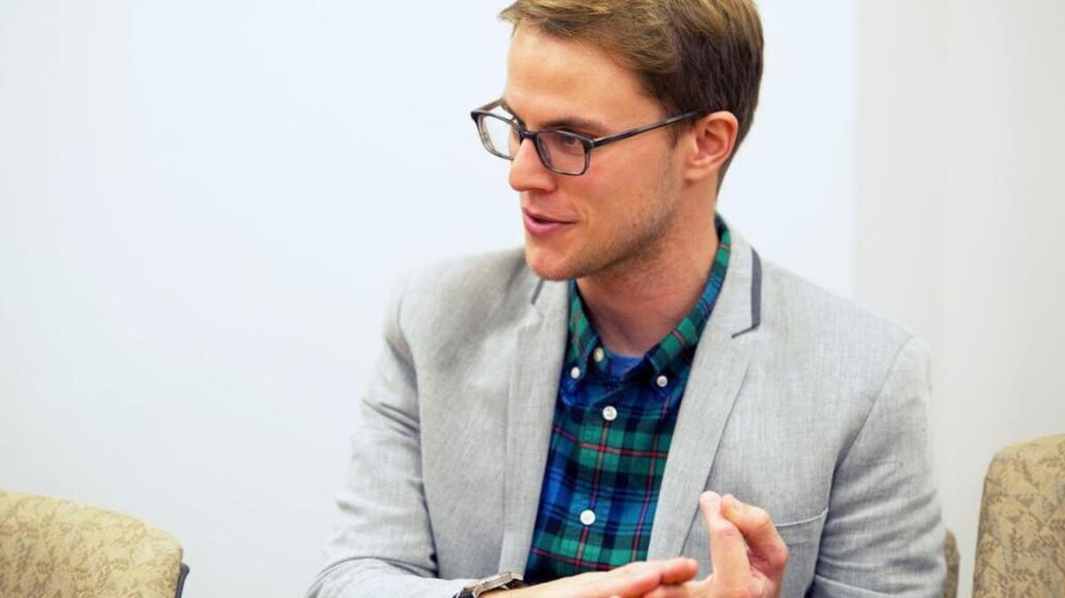 Penn State alumnus Mike Karns speaks about his experience working with the Broadway musical Hamilton on Sunday, at Carnegie Building on campus.