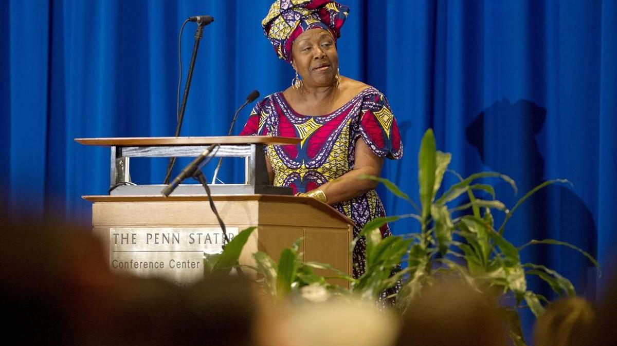 Dr. Grace Hampton receives the Humanitarian Award during the 41st annual Dr. Martin Luther King Jr. Memorial Banquet at the Penn Stater on Friday.