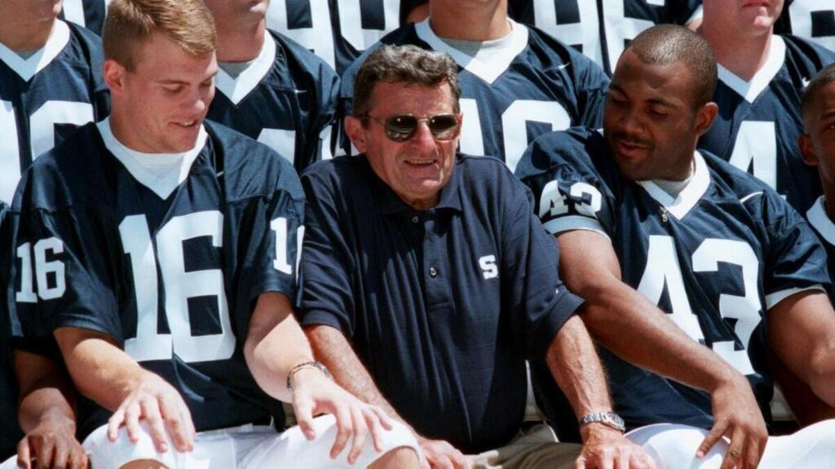 Former Penn State football player Brandon Short, right, pictured with coach Joe Paterno and fellow captain Kevin Thompson in 1999, announced Sunday his candidacy for one of three alumni-elected positions up this year on the university’s board of trustees.