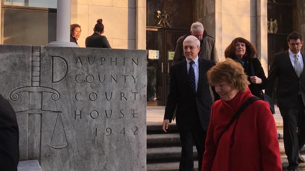 Former Penn State president Graham Spanier exits the Dauphin County Courthouse Tuesday in Harrisburg.