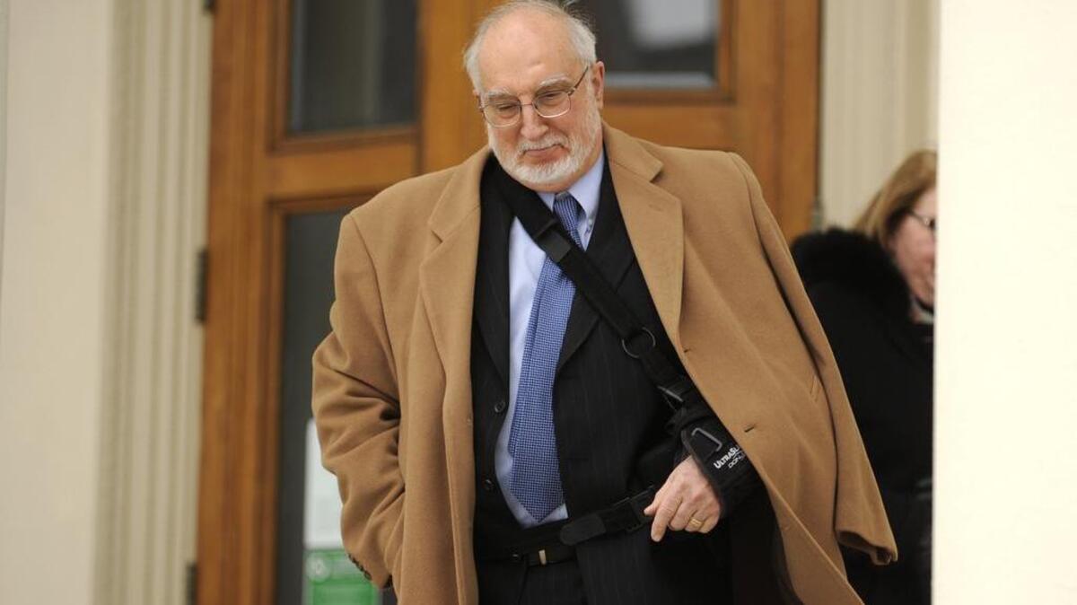 Judge John Leete exits the courthouse after a February 2015 hearing.