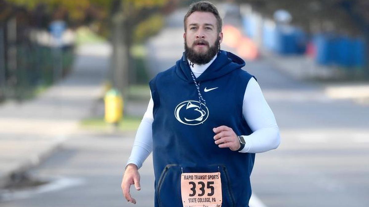 Max Rohn sprints to the finish line of the Penn State Ability Athletics’ Run, Walk and Roll Mile Race on Saturday. The event helps raise money for the program, which supports physically disabled athletes and local wounded warriors.